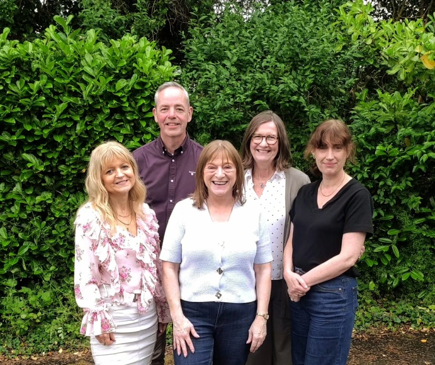 The Donegal Giving Board standing together outdoors